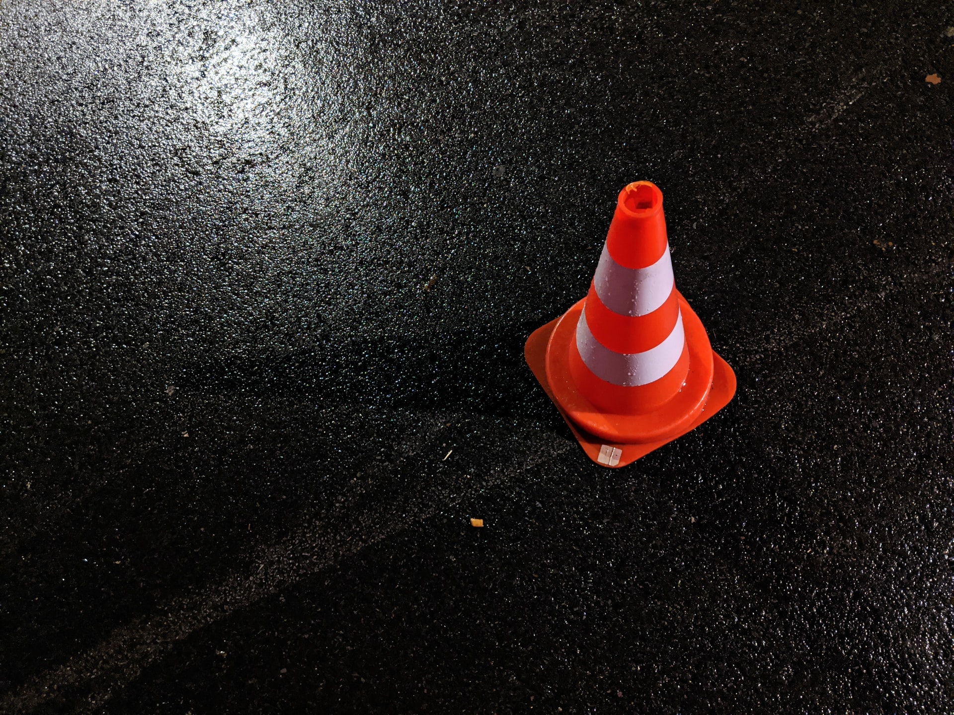 Orange cone in road