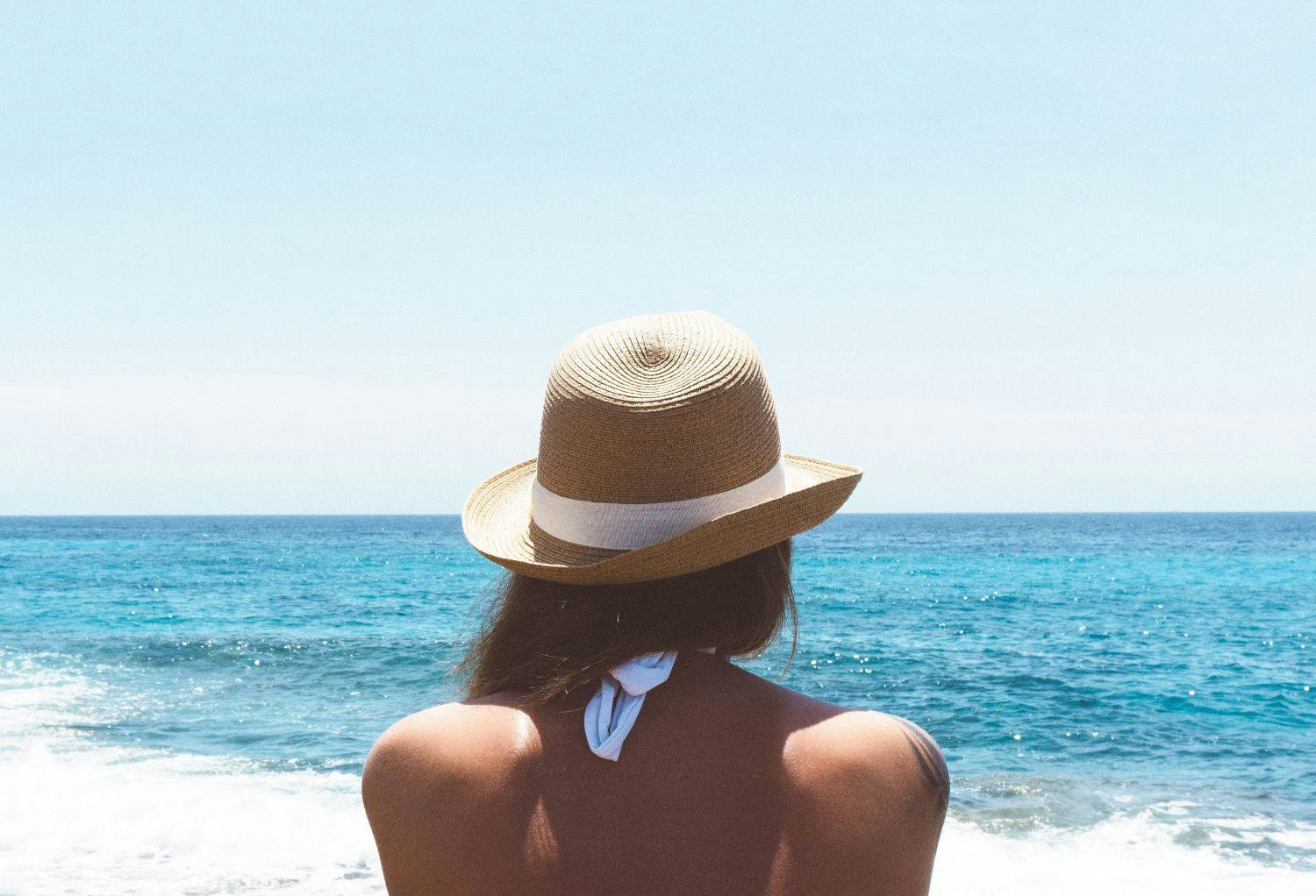 female looking out to sea