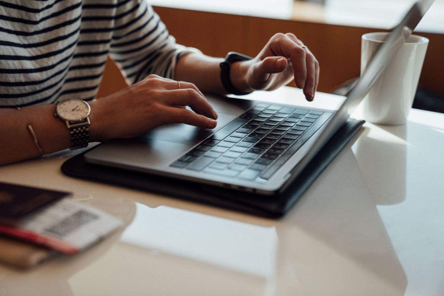 Person using laptop at desk