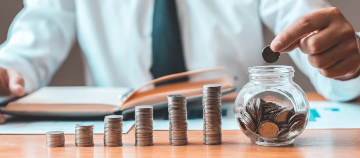 person working payroll counting coins